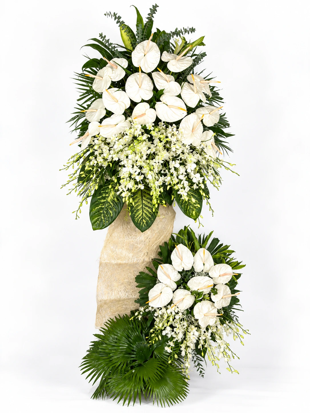Serenity white anthurium and orchid two-layer funeral stand with fan palm and eucalyptus
