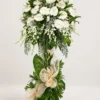Grace white anthurium and dendrobium orchid one-layer funeral stand with tropical leaf base and cream bow