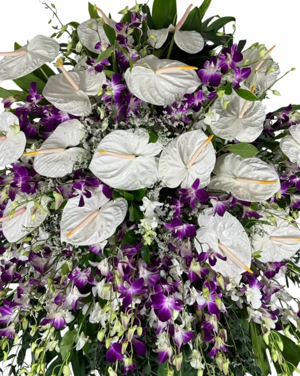 Solace White Anthurium & Purple Orchid Two Layer Funeral Stand